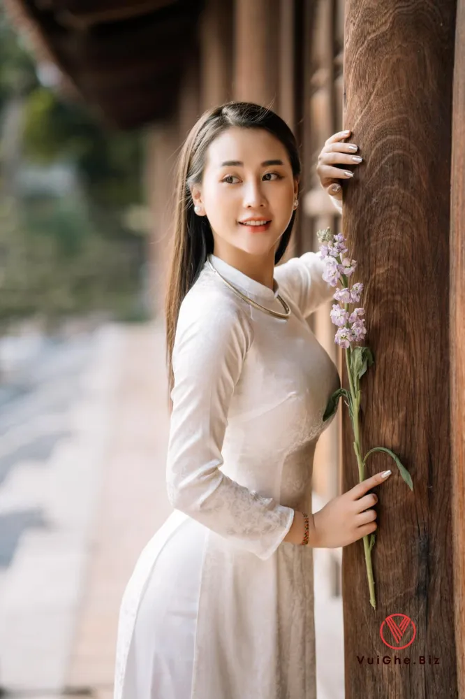 gai xinh mac ao dai khoe mong 96